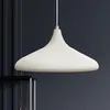A pendant lamp hangs in front of a dark gray wall. Produktbild-Vorschau