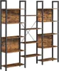 A freestanding bookshelf with multiple shelves and a metal frame. Produktbild-Vorschau
