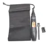 A black precision trimmer with accessories and a storage bag are laid out on a white background. Podgląd zdjęcia produktu