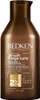 A brown bottle of Redken All Soft Mega Curls Shampoo. Produktbild-Vorschau