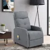 A gray massage recliner chair is shown in a living room setting. Podgląd zdjęcia produktu
