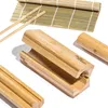 A set of bamboo sushi-making tools, including a rolling mat, chopsticks, and a sushi roller. Náhľad obrázku produktu