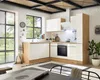 A modern kitchen with white cabinets and wood accents, featuring a large window overlooking a garden. Produktbild-Vorschau
