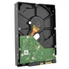 A close-up, angled view of the bottom of a black hard drive, showing the green circuit board and gold connectors. Produktbild-Vorschau