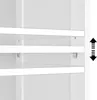 A close-up view of the interior of a white cabinet, showing three adjustable shelves. Podgląd zdjęcia produktu