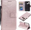 A collage of images showing a rose gold mandala-patterned flip phone case for a Samsung Galaxy A20e, including views of the case open, closed, and standing. Produktbild-Vorschau