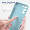 A hand is touching a light blue phone case, highlighting its matte surface and soft grip. Produktbild-Vorschau