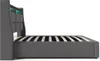 Side view of a grey upholstered bed frame with a wooden headboard and integrated LED lighting. Voir les images du produit