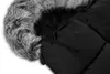 A close-up view of the hood and upper part of a black baby footmuff with faux fur trim. Náhled obrázku produktu