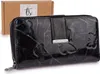 A black leather wallet with a butterfly embossed design is shown in front of a small cardboard box. Produktbild-Vorschau