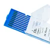 A close-up view of welding electrodes in a blue plastic case, with some packaging text visible. Náhľad obrázku produktu