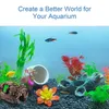 An aquarium scene with various decorations and fish. Produktbild-Vorschau