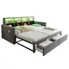 A pull-out bed with storage drawers and a bookshelf headboard with LED lighting. Náhled obrázku produktu
