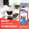 A coffee machine brewing coffee next to a bottle of descaler. Produktbild-Vorschau