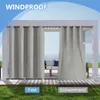 Outdoor curtains hanging on a pergola with a view of the ocean. Produktbild-Vorschau