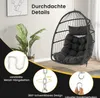 A hanging egg chair with cushions, shown indoors with a plant and artwork in the background. Insets highlight product features like chains and a carabiner. Podgląd zdjęcia produktu