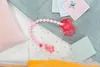 MGA BABY born Magischer Schnuller mit Clip Voir les images du produit 11
