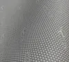 A close-up of a perforated material with text printed on it. Podgląd zdjęcia produktu