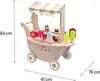 A wooden toy ice cream cart with various toy ice cream cones and popsicles displayed. Produktbild-Vorschau