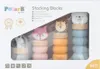 The image shows the retail packaging of a Viga PolarB stacking block toy set, featuring animal designs. Produktbild-Vorschau