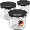 Three glass jars with black lids are arranged diagonally on a white background. Produktbild-Vorschau