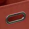 A close-up shot of a red fabric storage box with a silver handle. Náhled obrázku produktu