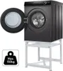 A washing machine is shown on a white stand, with its door open. A weight icon is visible in the lower left corner. Produktbild-Vorschau