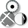 Three plates with black and white geometric patterns are arranged on a white background. Produktbild-Vorschau