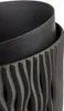 A close-up view of a textured planter with a black inner liner. Produktbild-Vorschau