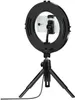 A black LED ring light with a smartphone mounted in the center, attached to a black tripod, against a white background. Produktbild-Vorschau