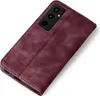A burgundy flip case for a smartphone is shown on a white background. Produktbild-Vorschau