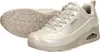 A pair of beige Skechers sneakers shown from a diagonal angle against a white background. Voir les images du produit