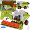 A toy remote-controlled combine harvester is displayed with its accessories and packaging. Produktbild-Vorschau