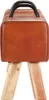 A vintage-style turnbock bank with handles made of genuine goatskin, supported by wooden legs. Voir les images du produit