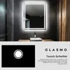 A modern bathroom with a lit mirror and sink. Produktbild-Vorschau