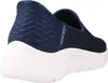 A side view of a navy blue Skechers slip-on sneaker with a white sole. Produktbild-Vorschau
