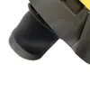 A close-up view of a black foam filter attached to a black plastic component, with a hint of yellow in the background. Produktbild-Vorschau