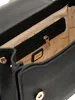 A close-up view of the interior of a black Guess handbag. Produktbild-Vorschau