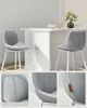 A set of two gray bar stools in a modern kitchen setting. Náhled obrázku produktu