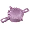 A purple ravioli maker is shown on a white background. Produktbild-Vorschau