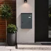SoBuy Paketbox OGS65-DG geschlossen an moderner Hauswand mit Pflanze und Lampe Vista previa de la imagen del producto