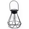 A black solar garden lantern with a diamond-shaped metal cage and a clear glass bulb inside, set against a white background. Produktbild-Vorschau