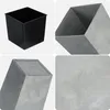 A collage of four images showing a black planter and a gray planter from different angles, with a close-up of the gray planter's texture. Produktbild-Vorschau