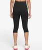 A person wearing black capri leggings and white athletic shoes, viewed from the back. Produktbild-Vorschau