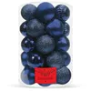 A clear, well-lit studio shot of a clear plastic container filled with dark blue Christmas ornaments. Podgląd zdjęcia produktu