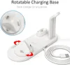 A white 4-in-1 charging station for multiple devices, including a phone, Apple Watch, and AirPods, is shown on a white background. The charging station has a wireless charging pad and multiple charging ports. Red arrows indicate the rotatable feature of on Produktbild-Vorschau
