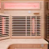Interior view of a wooden infrared sauna. Produktbild-Vorschau