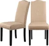 Two beige upholstered dining chairs with dark wooden legs are shown against a white background. Produktbild-Vorschau