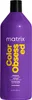 A studio shot of a large purple bottle of Matrix Total Results Color Obsessed Shampoo. Produktbild-Vorschau