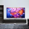 A modern living room setup with a large TV on a media console, a bookshelf, and a rug. Anteprima dell’immagine prodotto